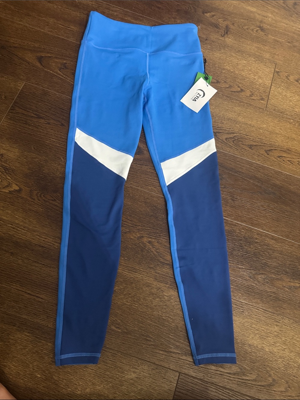 NWT. ZYIA Blue Colorblock Leggings with White Accents
